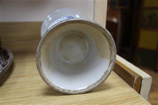 A 19th century Chinese blue and white vase, of Gu form, H. 13in.